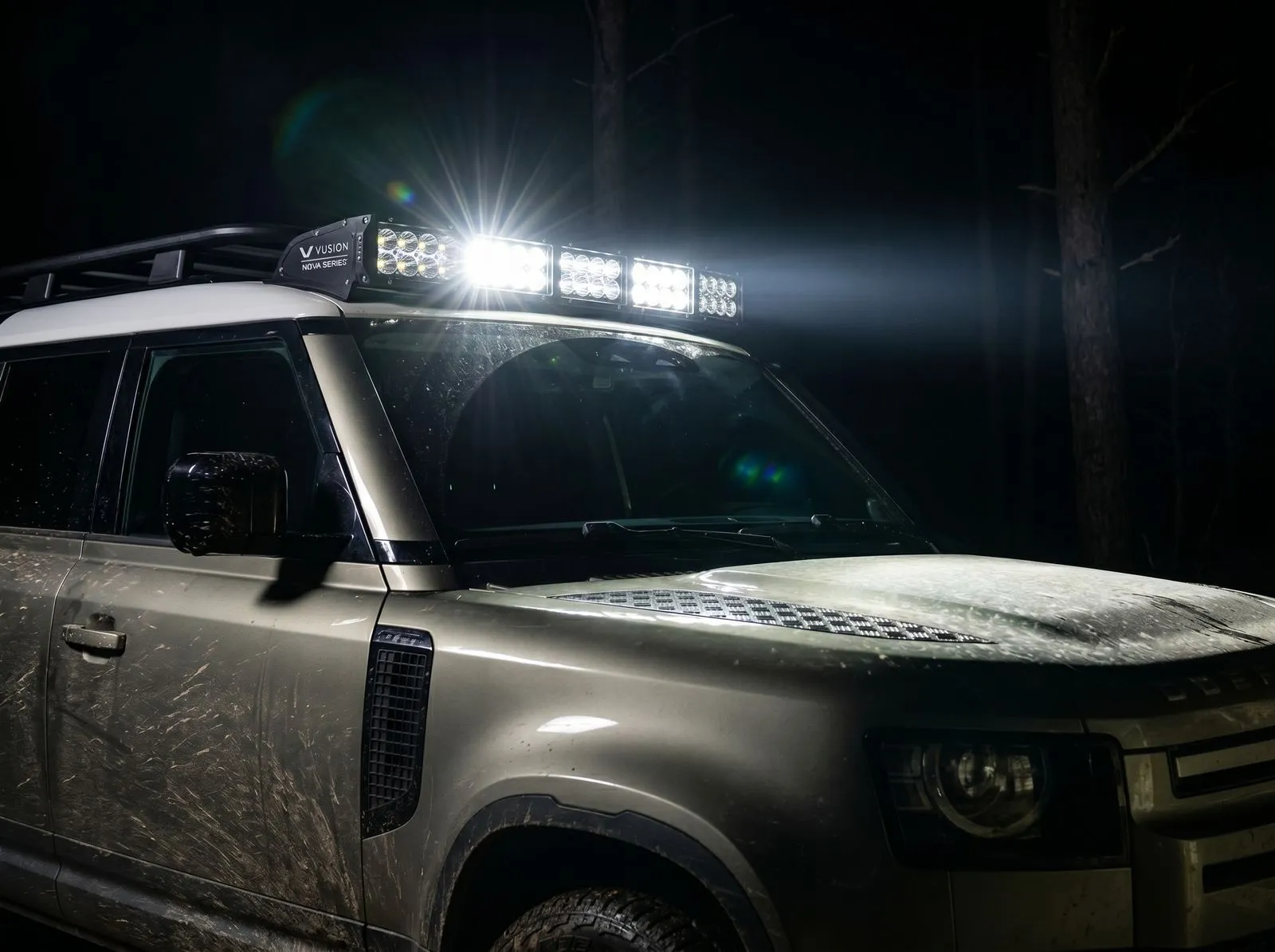 An offroad LED light bar mounted to a Land Rover Defender.